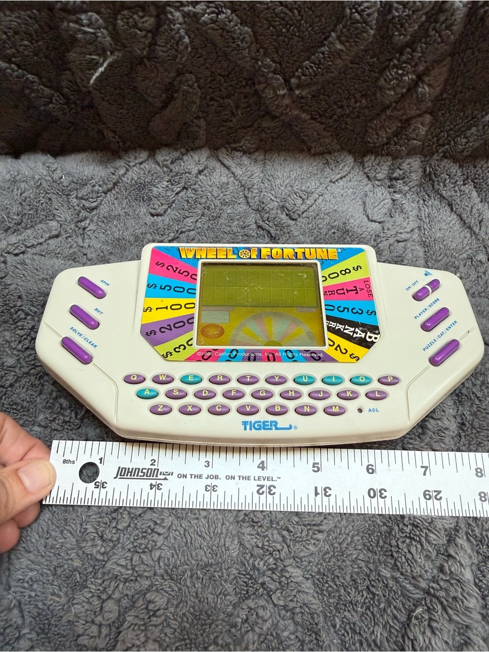 Vintage Tiger Electronics Wheel of Fortune Handheld Game (1995) – Tested-video